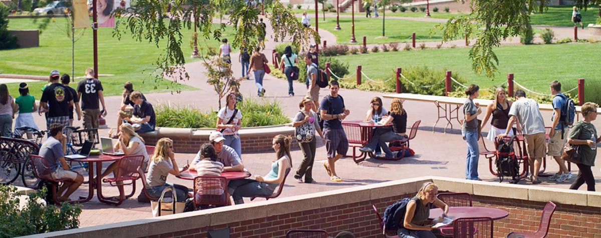 Students sitting on the patio